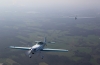 Samolot elektryczny Extra 330LE z silnikiem Siemensa holuje szybowiec